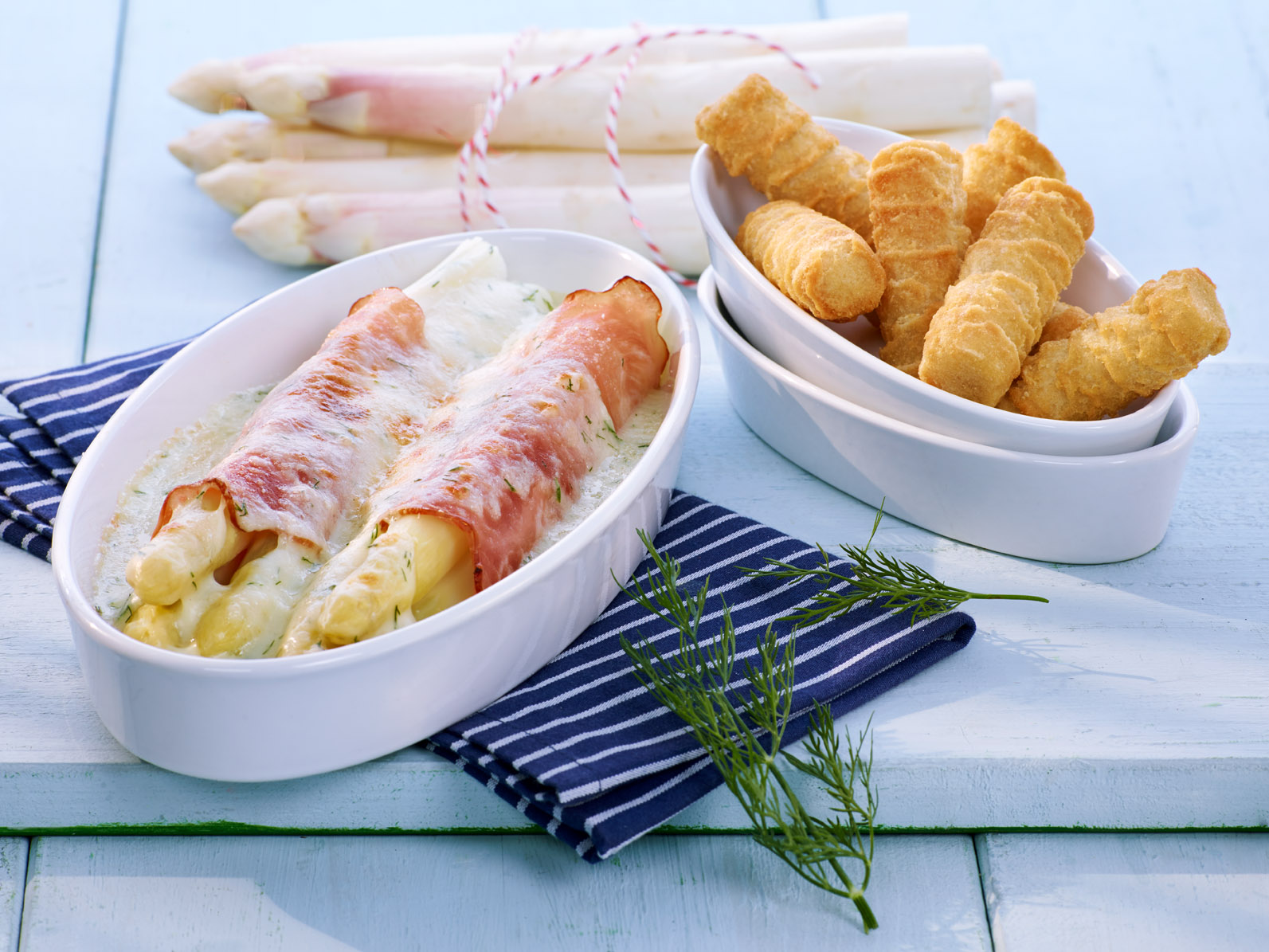 Gratinierte Spargel-Schinkenröllchen mit Kroketten