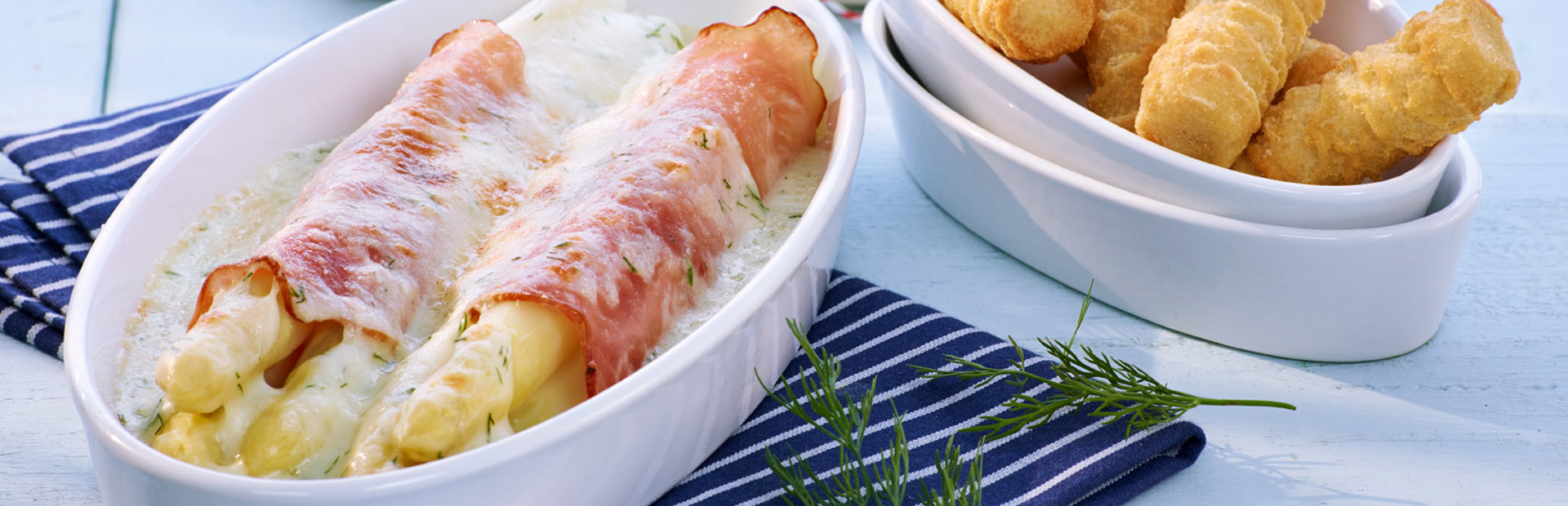 Gratinierte Spargel-Schinkenröllchen mit Kroketten